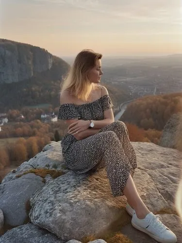 a foreign woman in white trainers on the Burgstein rock high above Unterhausen.,a woman sitting on a rock looks out over a valley,saxon switzerland,bastei,shipka,trifels,piatra,biljana,Photography,Doc