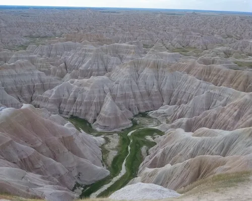 Badlands National Park - 036.jpg,horsheshoe bend,badlands national park,badlands,aeolian landform,hoodoos,altyn-emel national park,fairyland canyon,caldera,landform,crater rim,crater,geological phenom