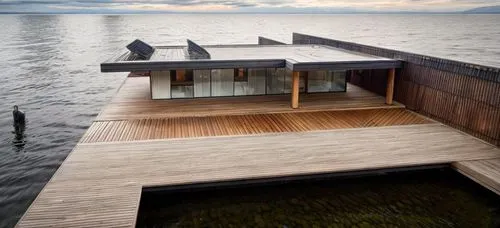 house by the water,house with lake,floating huts,stilt house,dunes house,boat house,houseboat,cubic house,wooden decking,house of the sea,summer house,beach house,wooden house,cube stilt houses,lago grey,boathouse,decking,floating stage,luxury property,infinity swimming pool,Architecture,General,Modern,Elemental Architecture