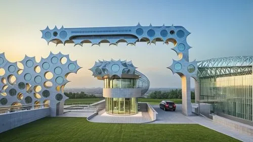 Iran Neurological Sciences Hospital entrance 
Inspired by neurons and nerve fibers of bionic architecture,the artistic building has a massive structure on its roof,dubai miracle garden,ashgabat,turkme