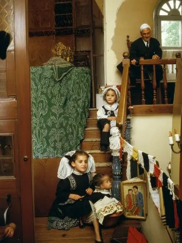 View into the upper-class household of a German Jew.,a number of children on stairs near stairs,parajanov,nuns,yasumasa,doll's house,sound of music,the little girl's room,Photography,Documentary Photo