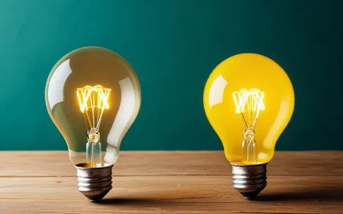 two bulbs with a bright glow are in front of a green wall,energy-saving bulbs,incandescent lamp,flood light bulbs,electric bulb,bright idea,light bulb moment