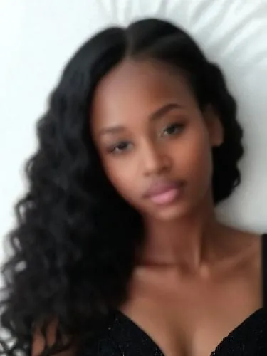 a woman posing with her long dark hair,blurred,blurriness,blurred vision,azania,jamelia,ayanda