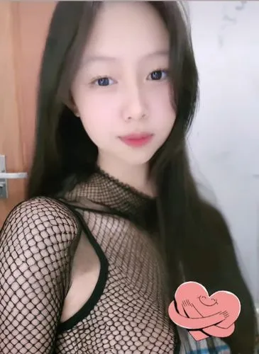 sexy black fishnet,a woman wearing fishnet clothing holding onto a wooden door,jennie,jungwirth,clc,yves,gorani,lq