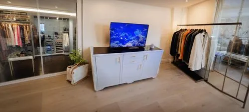 walk-in closet,women's closet,tv cabinet,entertainment center,wardrobe,showroom,modern room,closet,flat panel display,lisaswardrobe,modern decor,boutique,metal cabinet,modern style,armoire,switch cabinet,storage cabinet,room divider,contemporary decor,display case