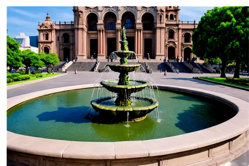 Mexico City, vibrant colors, ancient architecture, Palacio de Bellas Artes, Catedral Metropolitana, Zócalo square, ornate fountains, intricate stone carvings, lush greenery, blooming flowers, warm sun