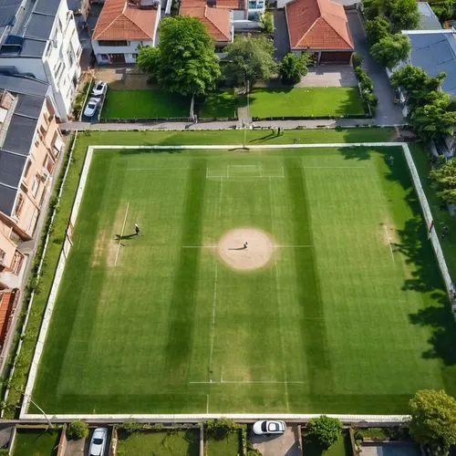 baseball diamond,soccer field,playing field,baseball field,football pitch,athletic field,aerial photography,drone view,drone shot,sports ground,champ de mars,bird's-eye view,aerial shot,drone image,football field,artificial turf,drone photo,view from above,sport venue,bird's eye view,Photography,General,Realistic