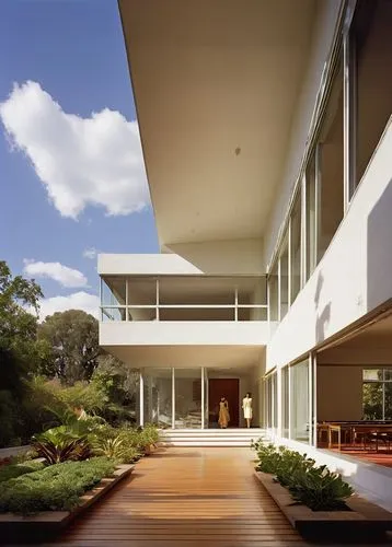 Mak Center for Art and Architecture, Schindler House, modernist building, white walls, large windows, wooden floors, minimalist interior, artistic exhibitions, sculptures, paintings, contemporary furn