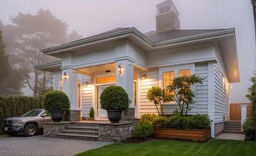 the exterior of a white house with two plants,new england style house,beautiful home,morning fog,two story house,bungalow,dreamhouse,Photography,General,Realistic