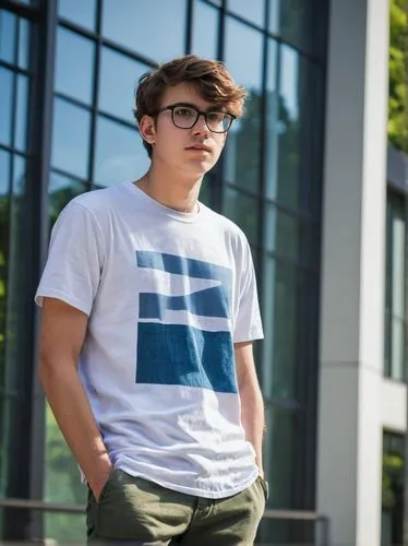 Young adult, male, architecture student, serious expression, black-framed glasses, short messy brown hair, casual wear, blue denim jeans, white graphic t-shirt, black sneakers, holding a large portfol