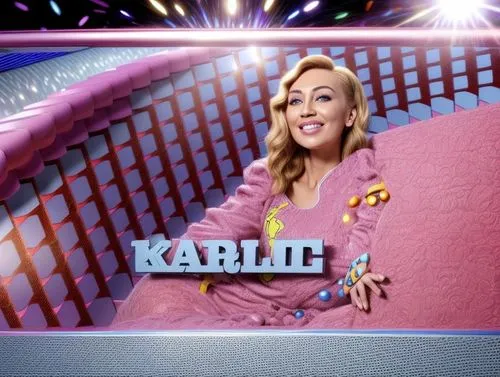 a woman wearing pink sitting on top of a couch,karolj,karol,karoli,karylle,karaites,karabulak