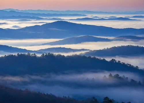 The weather this time of year in the Blue Ridge Mountains can change so quickly,  One moment clear blue skies. Foggy and rainy the next.  The fog, though, mutes the sounds, but enhances the colors, as