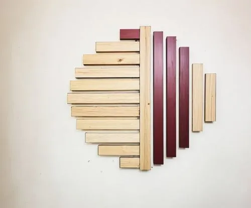 a wall decor made of wood and maroonmetal against a white background,several pieces of wood in a heart shape,bookshelf,bookstand,wooden shelf,bookcase,wooden ladder,wooden pencils,Photography,Document