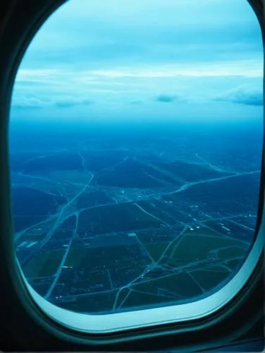 window seat,flight image,from the air,airplane wing,window view,inflight