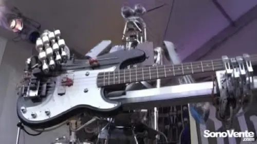 a guitar is on display at a show,squarepusher,stratocasters,headstocks,electric guitar,japandroids,headstock