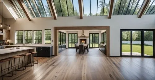 KITCHEN OVERLOOKING SUNROOM WITH DINING TABLE. TO THE LEFT A AWNING WINDOW OVERLOOKING OUTDOOR BARBEQUE SPACE AND TO THE RIGHT A LARGE PATIO DOOR OVERLOOKING PATIO STAIRS AND BEAUTIFUL GARDEN
,an empt