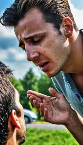 A frudy young man showing sympathy to a man crying.,dispute,violence against refugees,crying man,confrontation,arguing,krav maga,accuse,child crying,stage combat,hands over mouth,angry man,conflict,ci