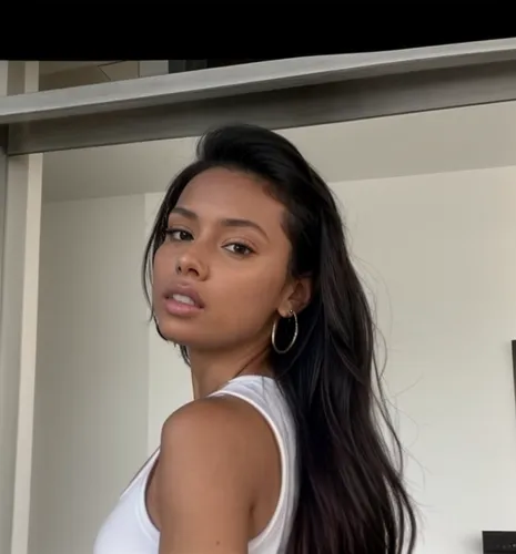 It is in the mall, an avenue of brand stores.  She walks and looks around.  She wears shorts and a white tank top.,nahri,liliyana,angolan,tiarra,panamanian,marshallese,thahane,azilah,filipina,namibian