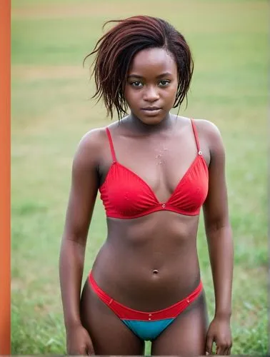 African girl with freckles,an attractive woman posing in a red and blue bikini,akuapem,kwashiorkor,danai,kenyan,ebony,malawian,Photography,Documentary Photography,Documentary Photography 04