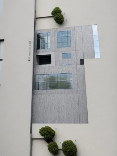 transparent window,apartment building,apartment block,urban design,urban art,environmental art,glass facade,facade painting,sky apartment,an apartment,glass facades,public art,trees with stitching,urb