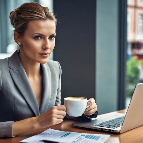 woman drinking coffee,women in technology,blur office background,place of work women,woman sitting,bussiness woman,Photography,General,Realistic