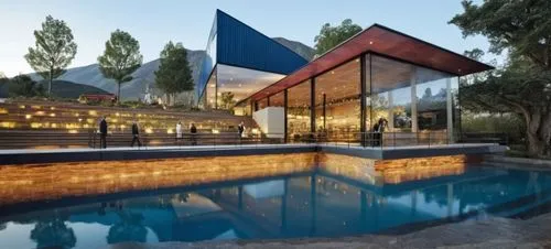 
RIO,a large pool in the middle of the garden next to a house,pool house,modern house,cubic house,cube house,modern architecture,mirror house